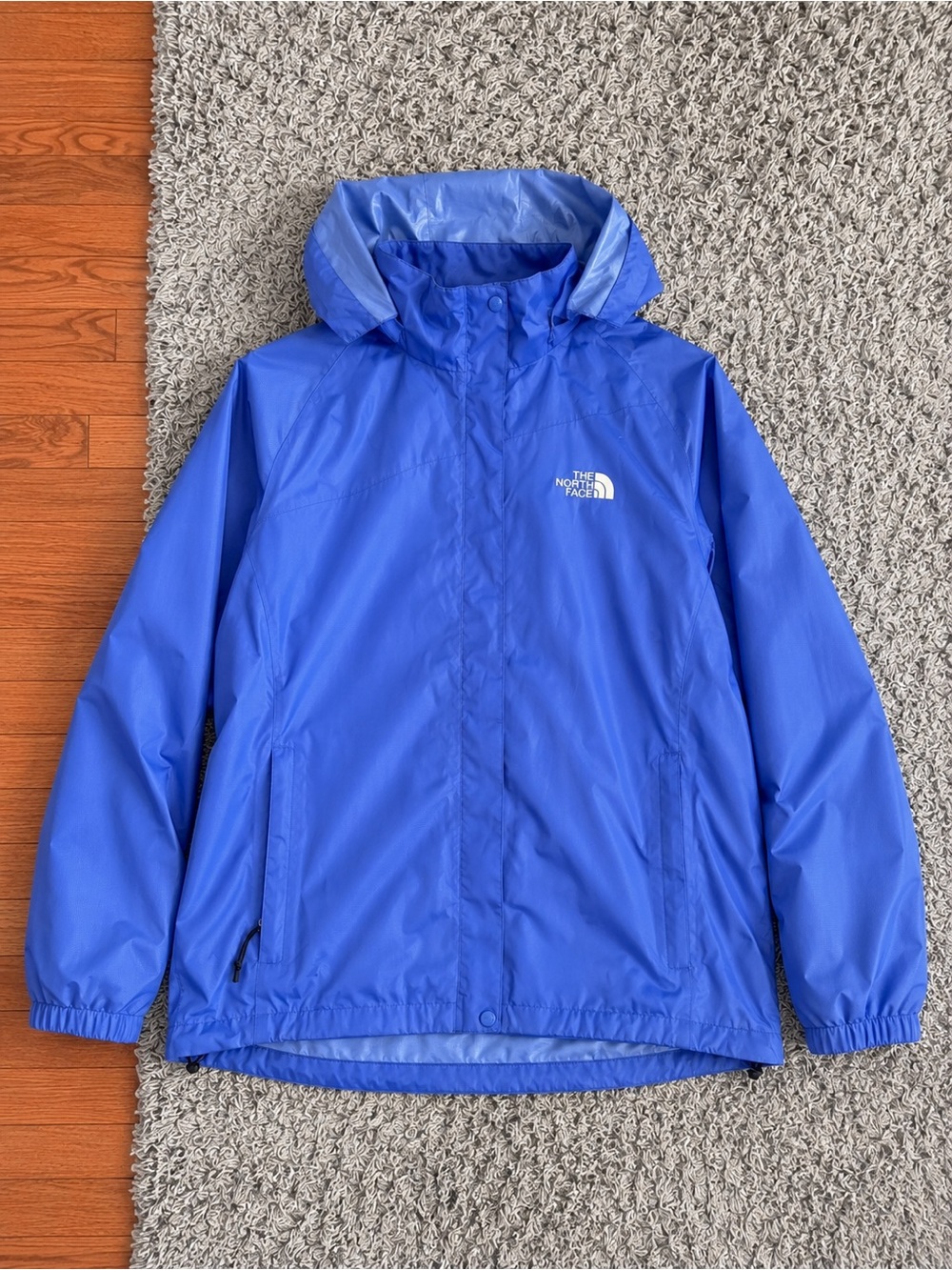 The North Face blue rain jacket size XL (fits M/L)